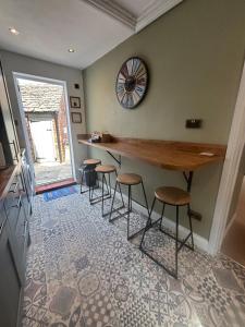 Ein Sitzbereich in der Unterkunft The Corner Cottage