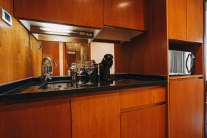 A kitchen or kitchenette at Time Select - Elegant Apartments