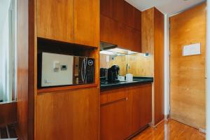 A kitchen or kitchenette at Time Select - Elegant Apartments