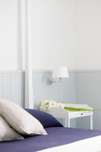 Posteľ alebo postele v izbe v ubytovaní I Pretti Resort
