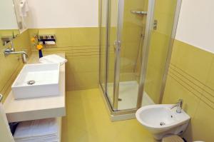 Koupelna v ubytování Hotel Monte Sarago