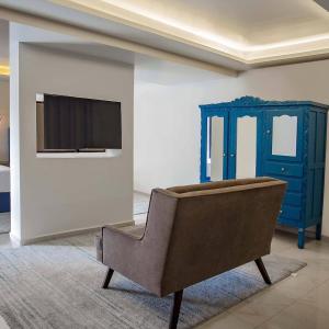 TV a/nebo společenská místnost v ubytování TRES79 Hotel Boutique Orizaba + 66 fotografií