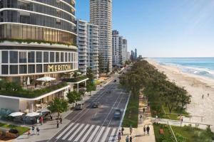 a view of a beach with buildings and the ocean at Beach Front 2BR Meriton Sunrise & Ocean Views in Gold Coast