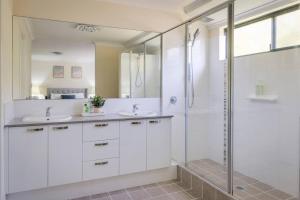 a bathroom with two sinks and a shower at The Monclair Retreat - Pet Friendly Dunsborough in Dunsborough +30 photos