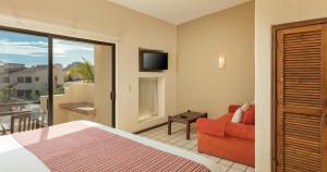 Телевизор и/или развлекательный центр в Solmar Resort
