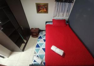 Ένα ή περισσότερα κρεβάτια σε δωμάτιο στο Espectacular apartamento familiar 1er piso - 04 personas - El Edén Centro Comercial +7 φωτογραφίες