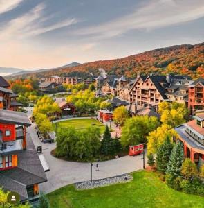 an aerial view of a small town in the mountains at Spruce Peak Resort luxury 3 Bedrm 2levelApartment in Stowe