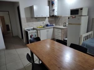 Η κουζίνα ή μικρή κουζίνα στο Departamentos Andrés