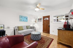 a living room with a couch and a table at Inn on the Russian River in Monte Rio