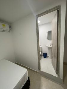 Postel nebo postele na pokoji v ubytování Lago Hotel