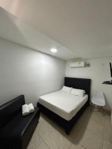 Postel nebo postele na pokoji v ubytování Lago Hotel