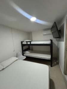Postel nebo postele na pokoji v ubytování Lago Hotel