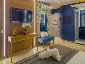 Μια τηλεόραση ή/και κέντρο ψυχαγωγίας στο Sherwood Motel