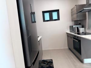 Η κουζίνα ή μικρή κουζίνα στο Sky serenity two rooms apartment