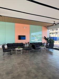 TV a/nebo společenská místnost v ubytování SMDC Park Residences Unit 202
