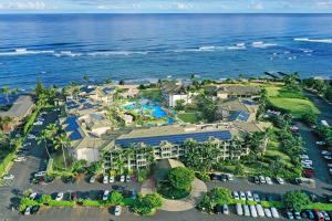 an aerial view of a resort next to the ocean at Waipouli Beach Resort H301 in Wailua