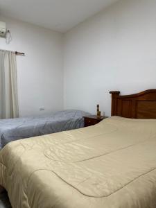 Ένα ή περισσότερα κρεβάτια σε δωμάτιο στο Finca Alta Gracia hasta 4 personas, La Banda