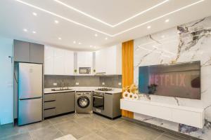 Η κουζίνα ή μικρή κουζίνα στο Princess resort luxury G05