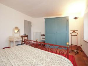 Postel nebo postele na pokoji v ubytování Luxurious Apartment in Rocca Grimalda with Garden