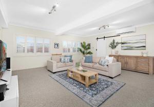 Area soggiorno di Shellharbour Poolside Escape