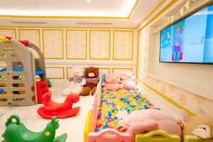 a room filled with lots of different kinds of toys at Dalat Palace Heritage Hotel in Da Lat
