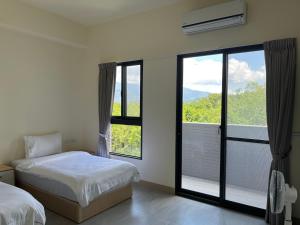 Katil atau katil-katil dalam bilik di 瑞穗阿牛的家 Rui Sui Moo Guesthouse
