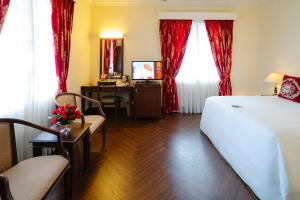 Voodi või voodid majutusasutuse Du Parc Hotel Dalat toas