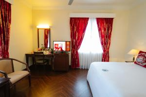 Voodi või voodid majutusasutuse Du Parc Hotel Dalat toas