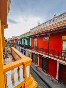 a view of a street with colorful buildings at Hostal Casa Torres Cartagena Centro Historico - Adults Only in Cartagena de Indias