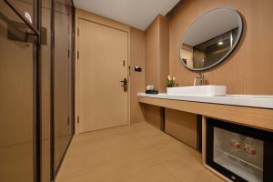 Ένα μπάνιο στο Baiman Hotel Beijing South Railway Station Heyi Subway Station Branch