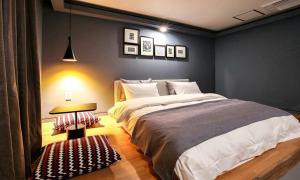 Gimhae Browndot Hotel Waterpark客房内的一张或多张床位