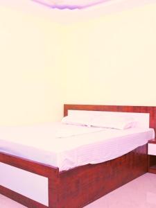 Postel nebo postele na pokoji v ubytování Sunset Beach Resort