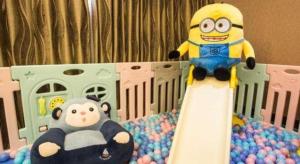 a cake with a minion on top of a crib at Nanning Yongjiang Hotel in Nanning