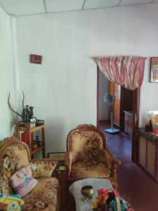 Χώρος καθιστικού στο Fruit & Spice garden home stay