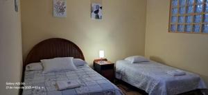 Postel nebo postele na pokoji v ubytování Lopez House