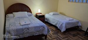 Postel nebo postele na pokoji v ubytování Lopez House