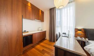 Kuchyň nebo kuchyňský kout v ubytování Dobong Hotel Bay204