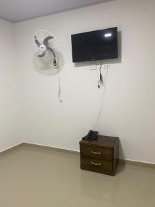 TV a/nebo společenská místnost v ubytování Hotel Pablo Jaraba Diaz