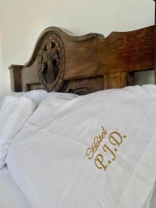 Postel nebo postele na pokoji v ubytování Hotel Pablo Jaraba Diaz