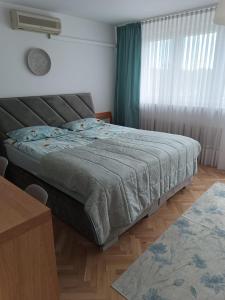 Posteľ alebo postele v izbe v ubytovaní ul.Powstania Wielkopolskiego 18