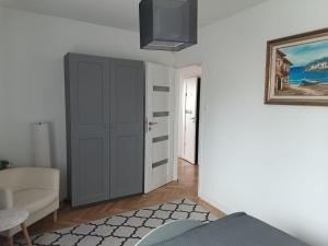 Posteľ alebo postele v izbe v ubytovaní ul.Powstania Wielkopolskiego 18