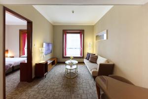 Un pat sau paturi într-o cameră la Rosedale Hotel Hong Kong
