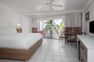Grand Decameron Montego Beach, A Trademark All-Inclusive Resortにあるベッド
