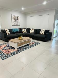 Χώρος καθιστικού στο Huntlee Haven Luxe
