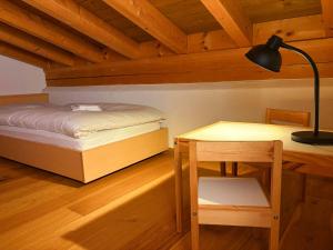 Postel nebo postele na pokoji v ubytování Madrisa Lodge