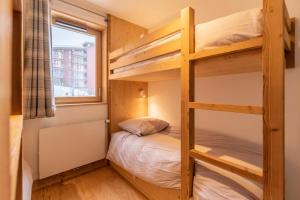 Ένα ή περισσότερα κρεβάτια σε δωμάτιο στο Résidence L'ecrin - ECRIN B41 MAE-0091