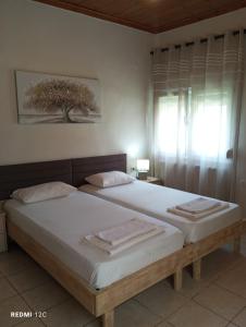 Postel nebo postele na pokoji v ubytování Sunray Separate Villa