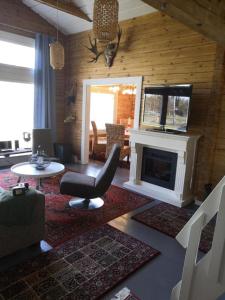 Posezení v ubytování Koljonvirta Cottages + 28 fotografií