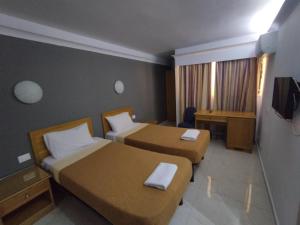 The Windsor Hotel客房内的一张或多张床位
