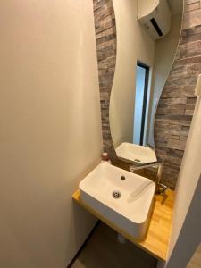 Koupelna v ubytování 長橋屋